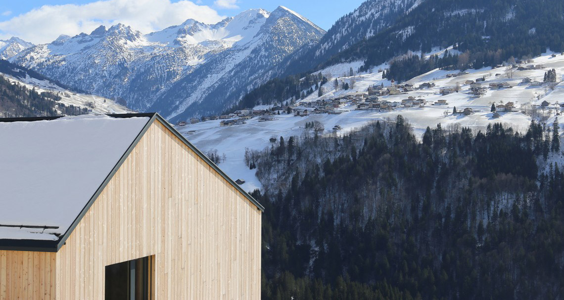 House nestled on a steep slope. Breathtaking views of the Austrian landscape