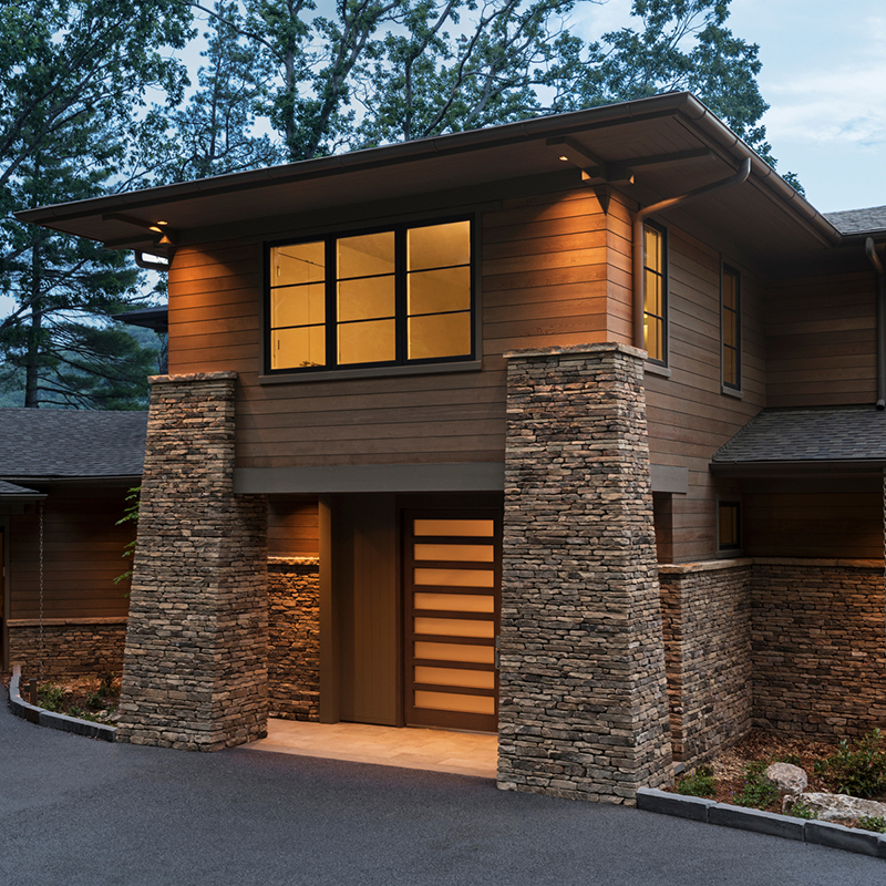 Wooden house with stone base