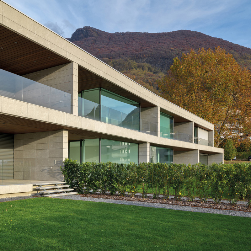 Wooden condominium and concrete base