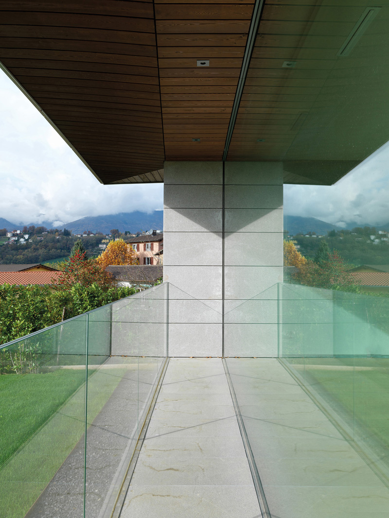 Wooden condominium and concrete base