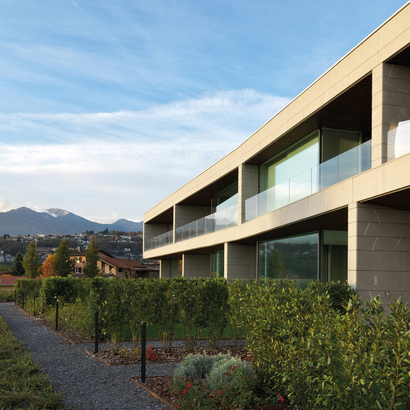 Wooden condominium and concrete base