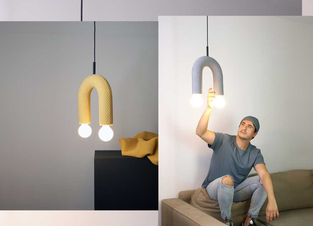 Luce che racconta delle cose comuni. Illuminazione contemporanea handmade in tessuto