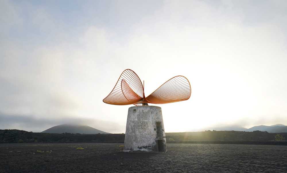 Among the volcanoes of Lanzarote, a windmill-turbine combination of poetry and technology