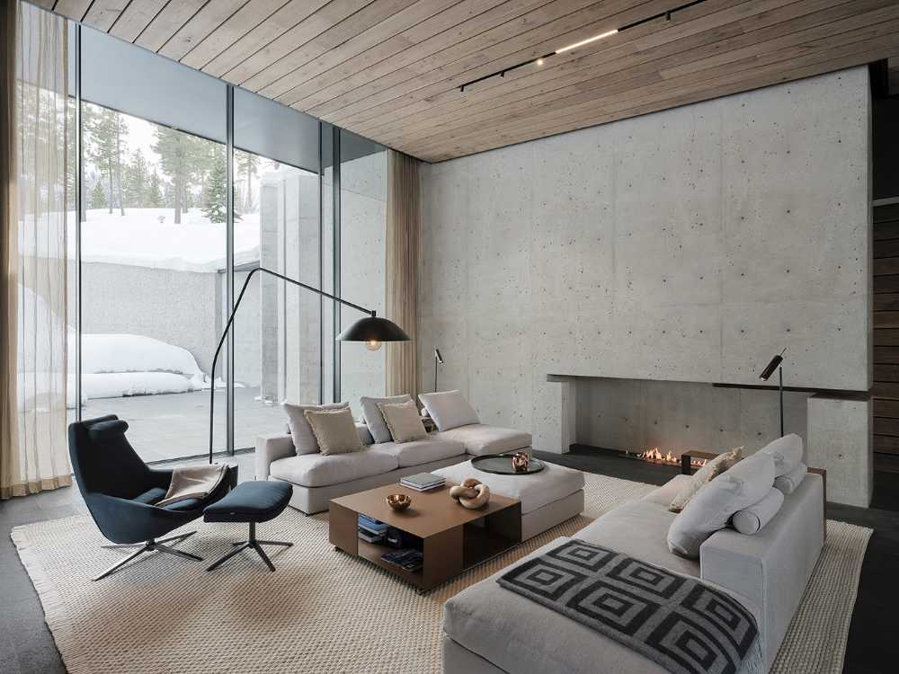 A minimal palette of materials: wood, concrete, and steel define the spaces of Lookout House.