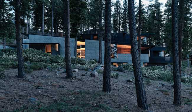 A minimal palette of materials: wood, concrete, and steel define the spaces of Lookout House.