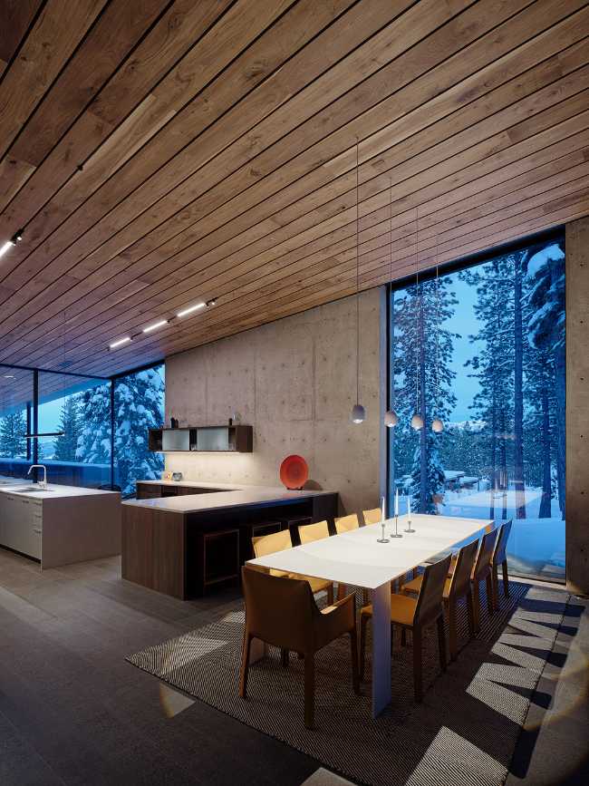 A minimal palette of materials: wood, concrete, and steel define the spaces of Lookout House.