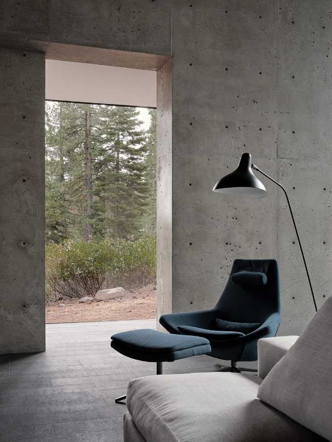A minimal palette of materials: wood, concrete, and steel define the spaces of Lookout House.