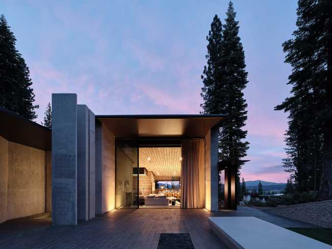 A minimal palette of materials: wood, concrete, and steel define the spaces of Lookout House.