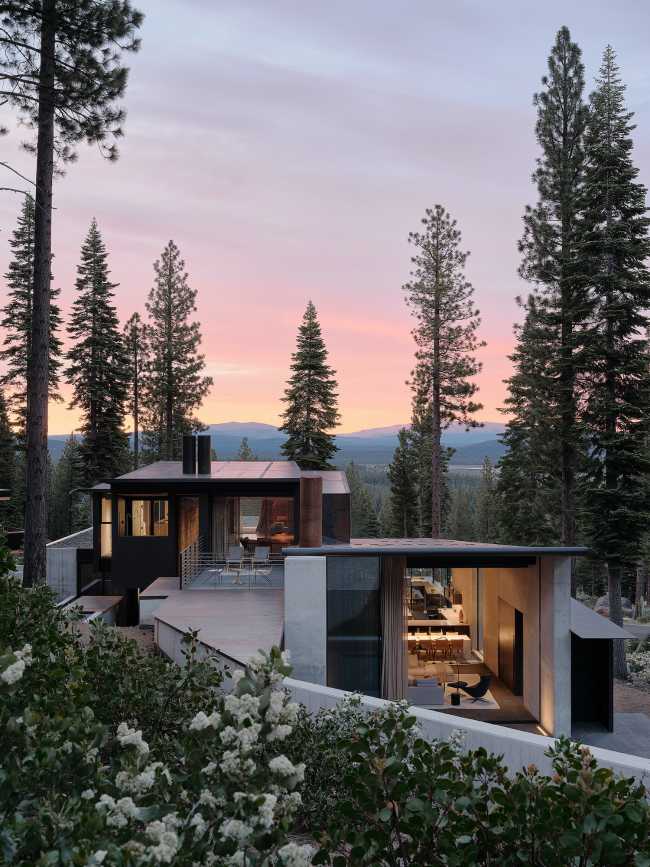A minimal palette of materials: wood, concrete, and steel define the spaces of Lookout House.