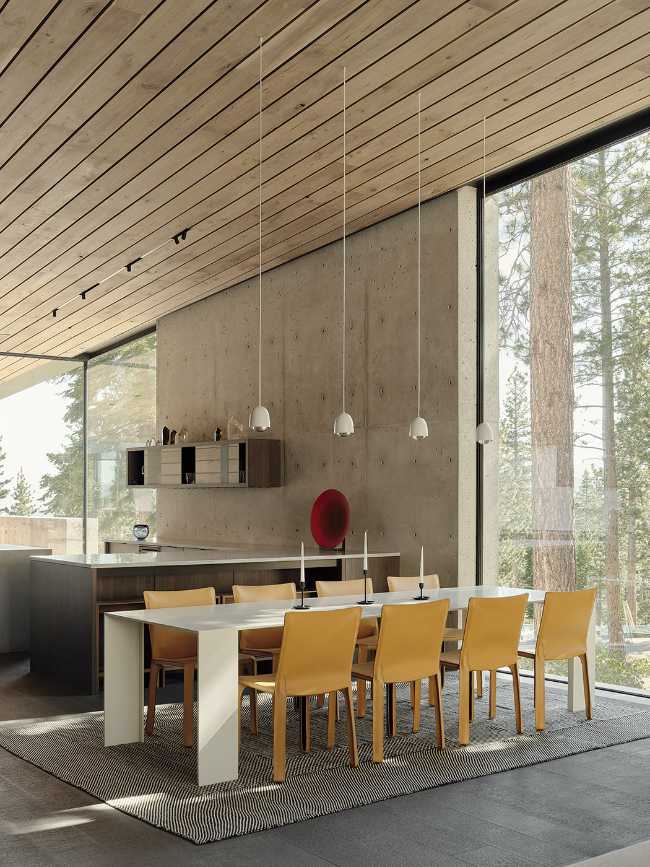 A minimal palette of materials: wood, concrete, and steel define the spaces of Lookout House.