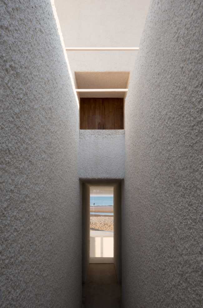 Seashore Chapel as a century-old gift from the ocean lying on the beach