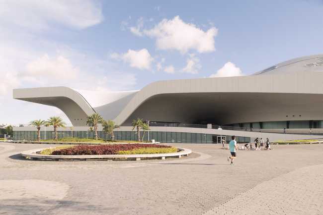 National Kaohsiung Centre for the Arts, a majestic architectural tree enshrines the city's artistic life under its protective canopy