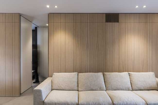 Bespoke paneling and optimized spaces: Contaminations, fine renovation of a family apartment in Bari, Italy