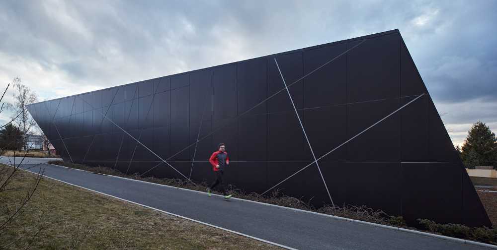 Louny municipal swimming pool is like a sharp rock revealing its precious heart for the well-being of citizens