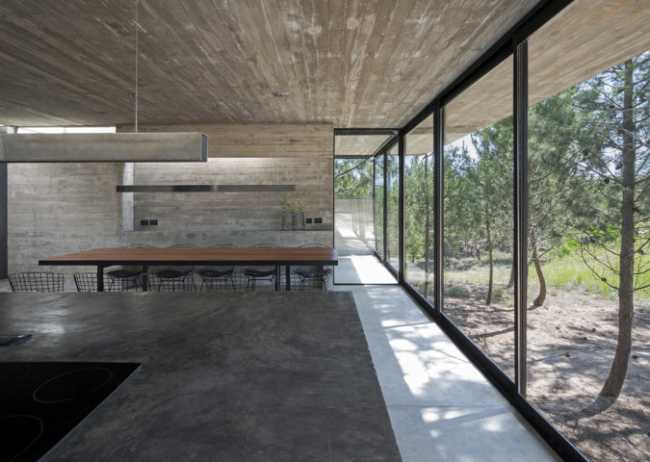 Architecture for architects at Casa L4. Exposed concrete and landscape