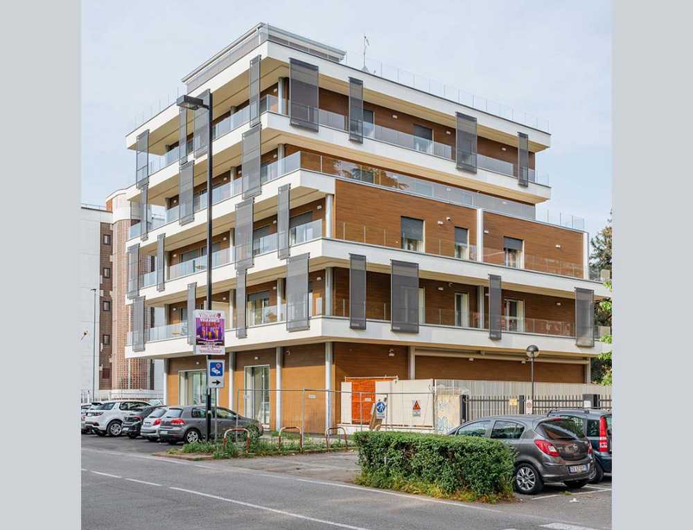 Residence Gorki 75 in Cinisello Balsamo. Solid square and Decò wood