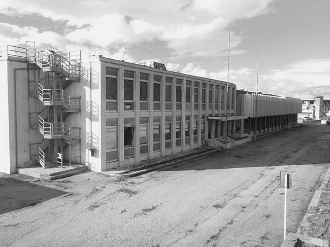 Headquarters Capua1880: landmark of a regenerative transformation