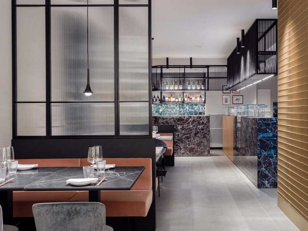 KANTO restaurant featuring tubular structures, marble, brass, and velvets