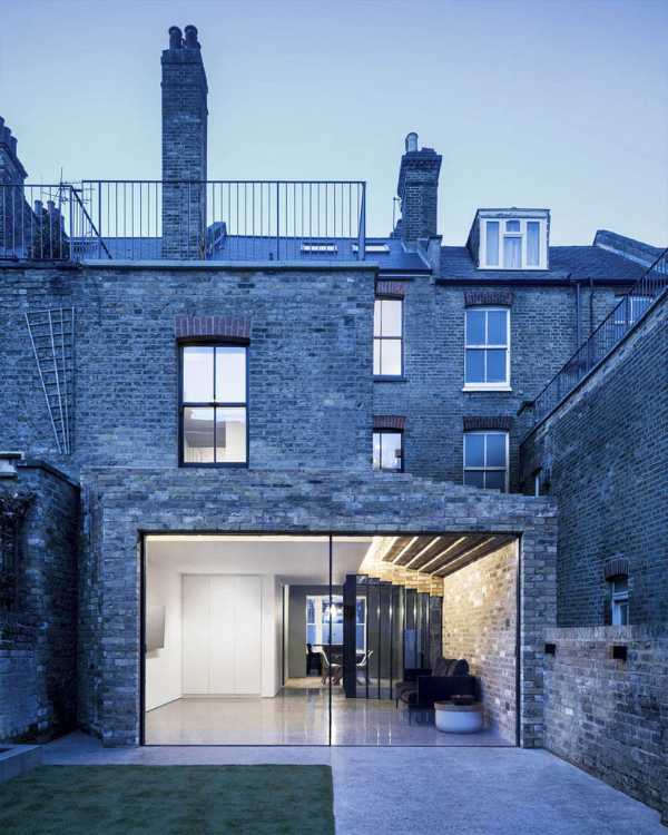 brick terraced house with large window