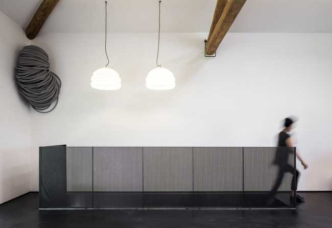 The loft area and the metal railing