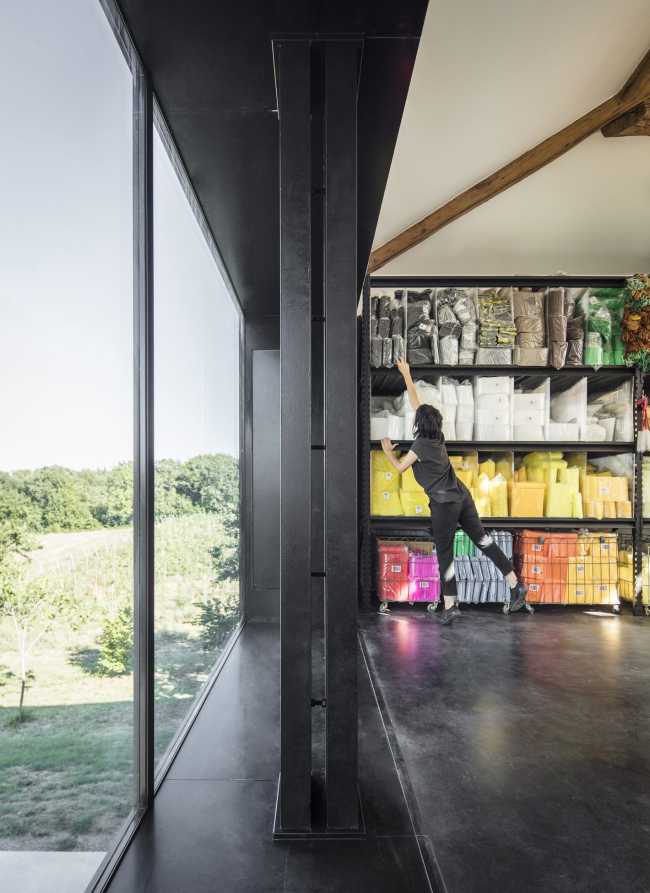 The large black projected glass window