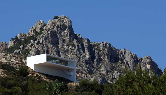 White villa suspended on the sea