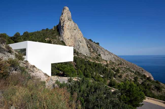 White villa suspended on the sea
