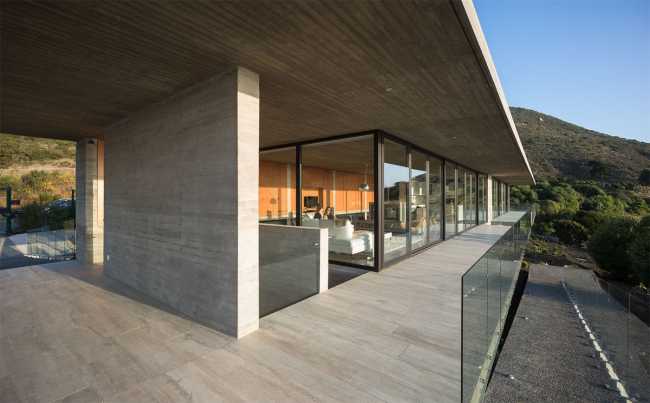 Concrete villa with glass balustrade