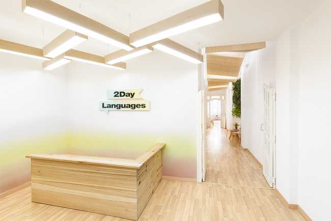 Interior wood and white for a language school