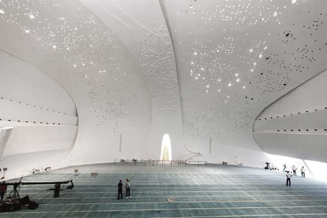university qatar minimalist fluid forms building