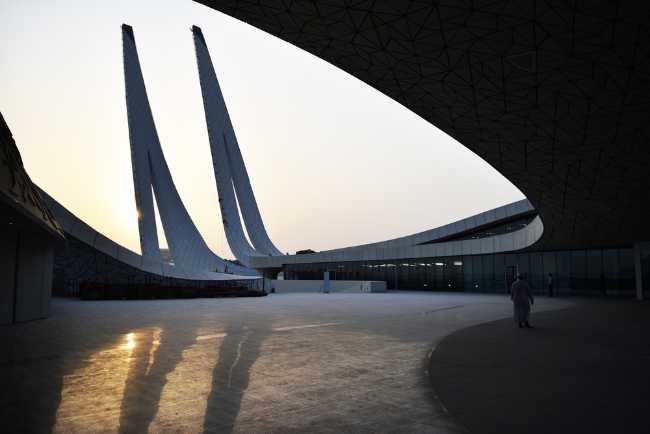 university qatar minimalist fluid forms collective space