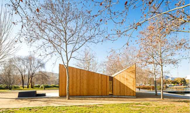 Wooden module with sloping roof