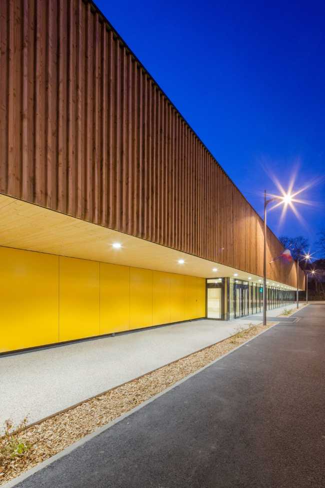 Hacine Cherifi Sports Center: wooden gyms serving schools and the neighborhood