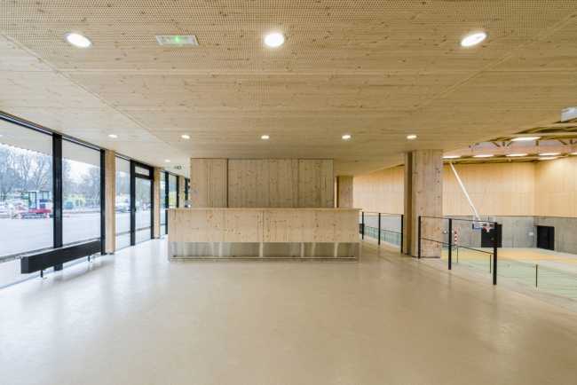 Hacine Cherifi Sports Center: wooden gyms serving schools and the neighborhood