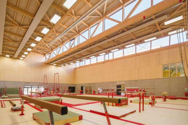 Hacine Cherifi Sports Center: wooden gyms serving schools and the neighborhood