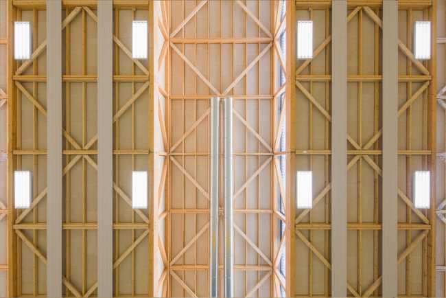 Hacine Cherifi Sports Center: wooden gyms serving schools and the neighborhood