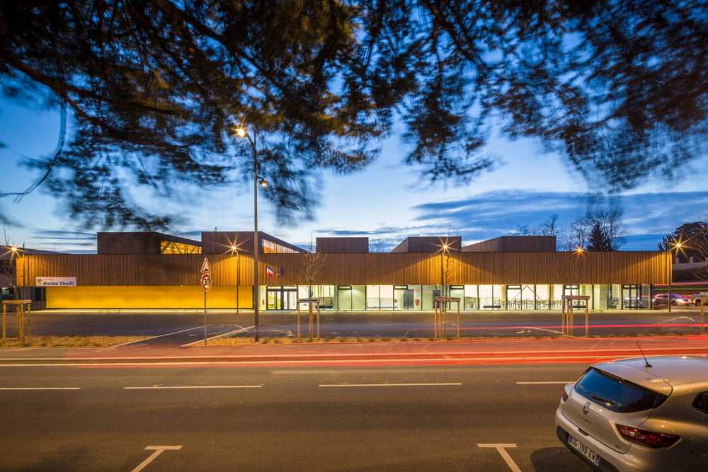 Hacine Cherifi Sports Center: wooden gyms serving schools and the neighborhood
