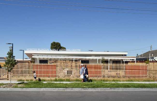 wooden fence on a road