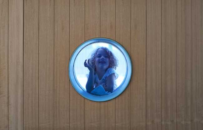 Porthole and wooden wall