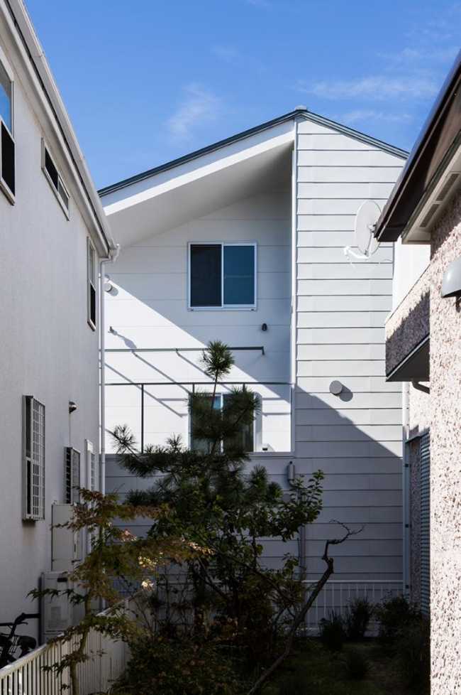 wooden house with double pitched roof
