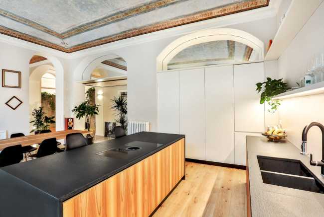 Wooden kitchen with black top