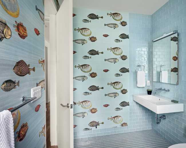 Bathroom with fish drawn on the walls