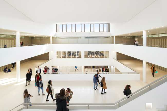 Atrium with multiple heights in white