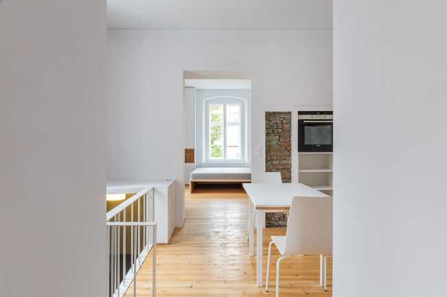 Modern white interiors in a medieval house