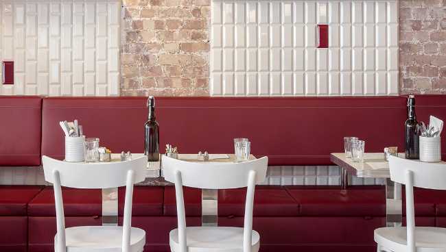 Red chairs and white table