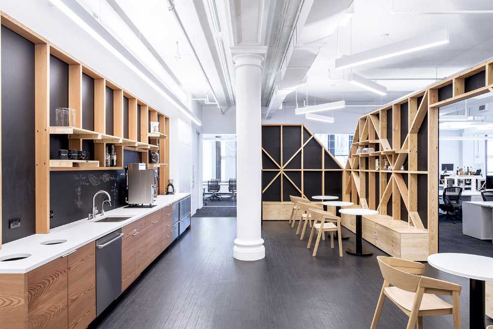 Office with wooden structures as partitions