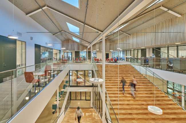 Interior wooden school large staircase