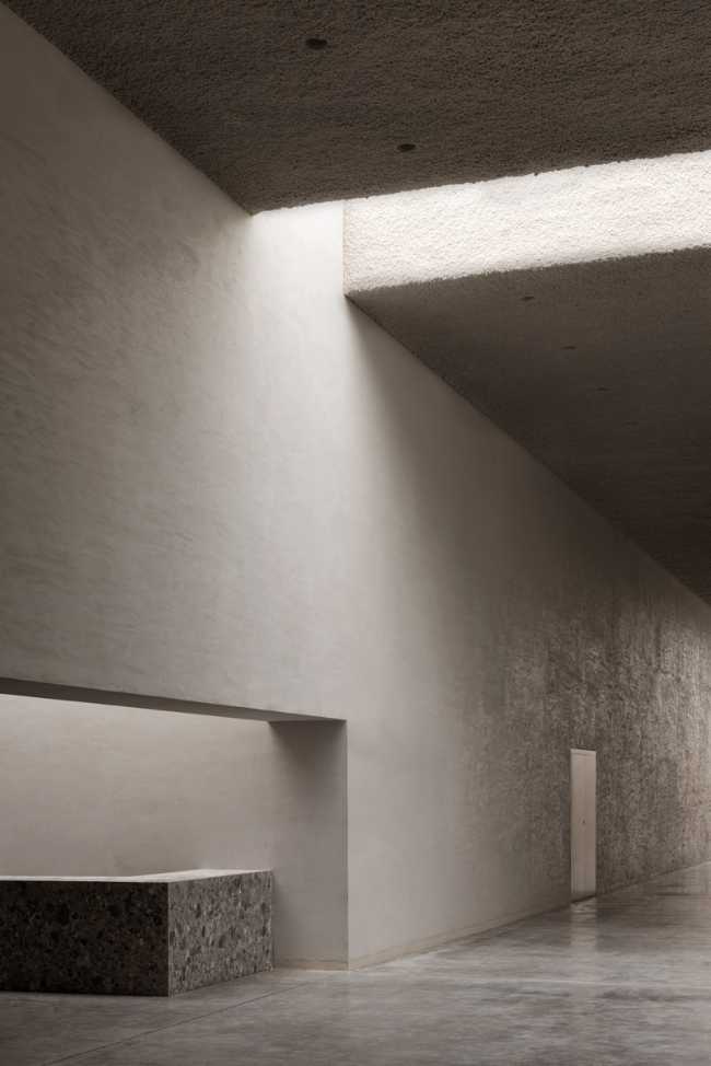 Crematorium Belgium concrete and marble light from above
