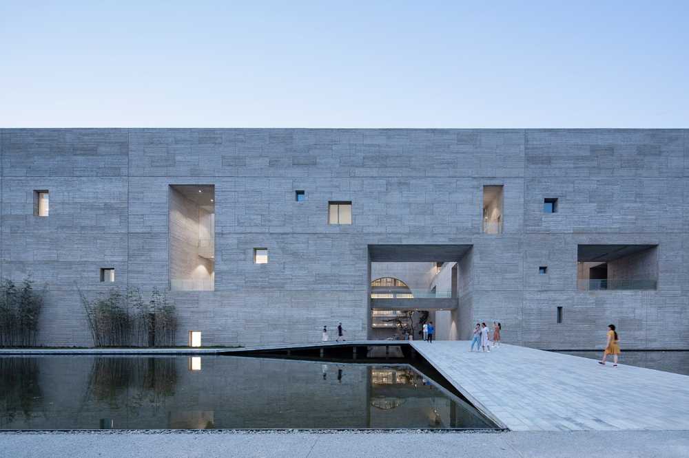 cultural center structure concrete lake entrance