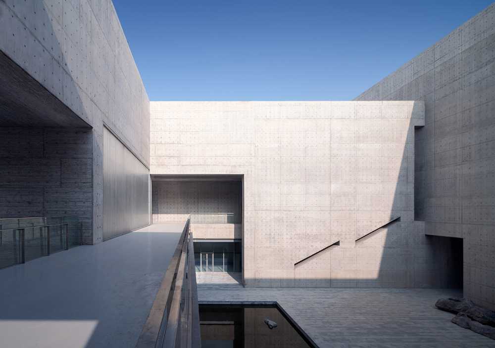 cultural center structure concrete lake entrance